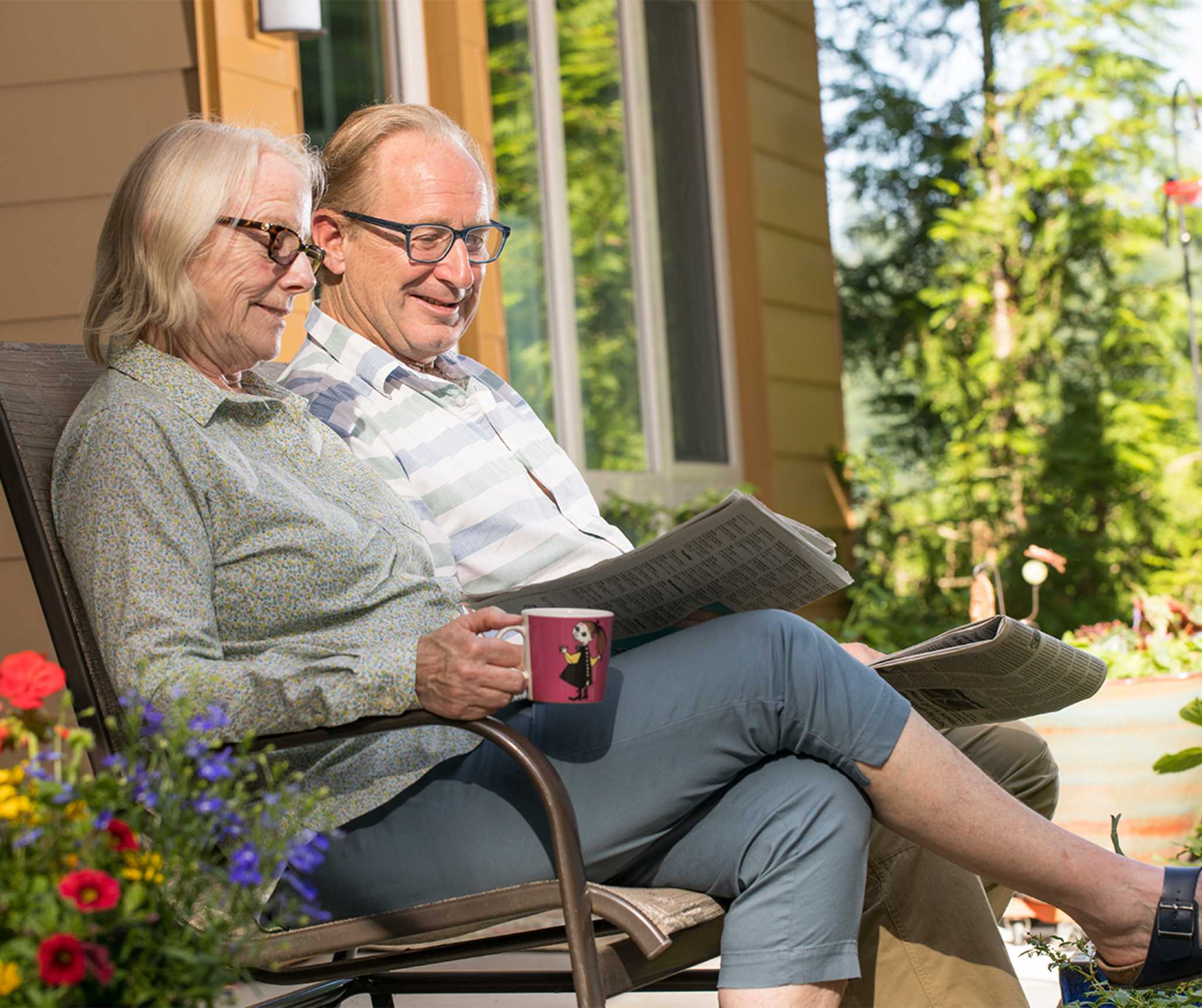 two seniors enjoy research for their senior living community