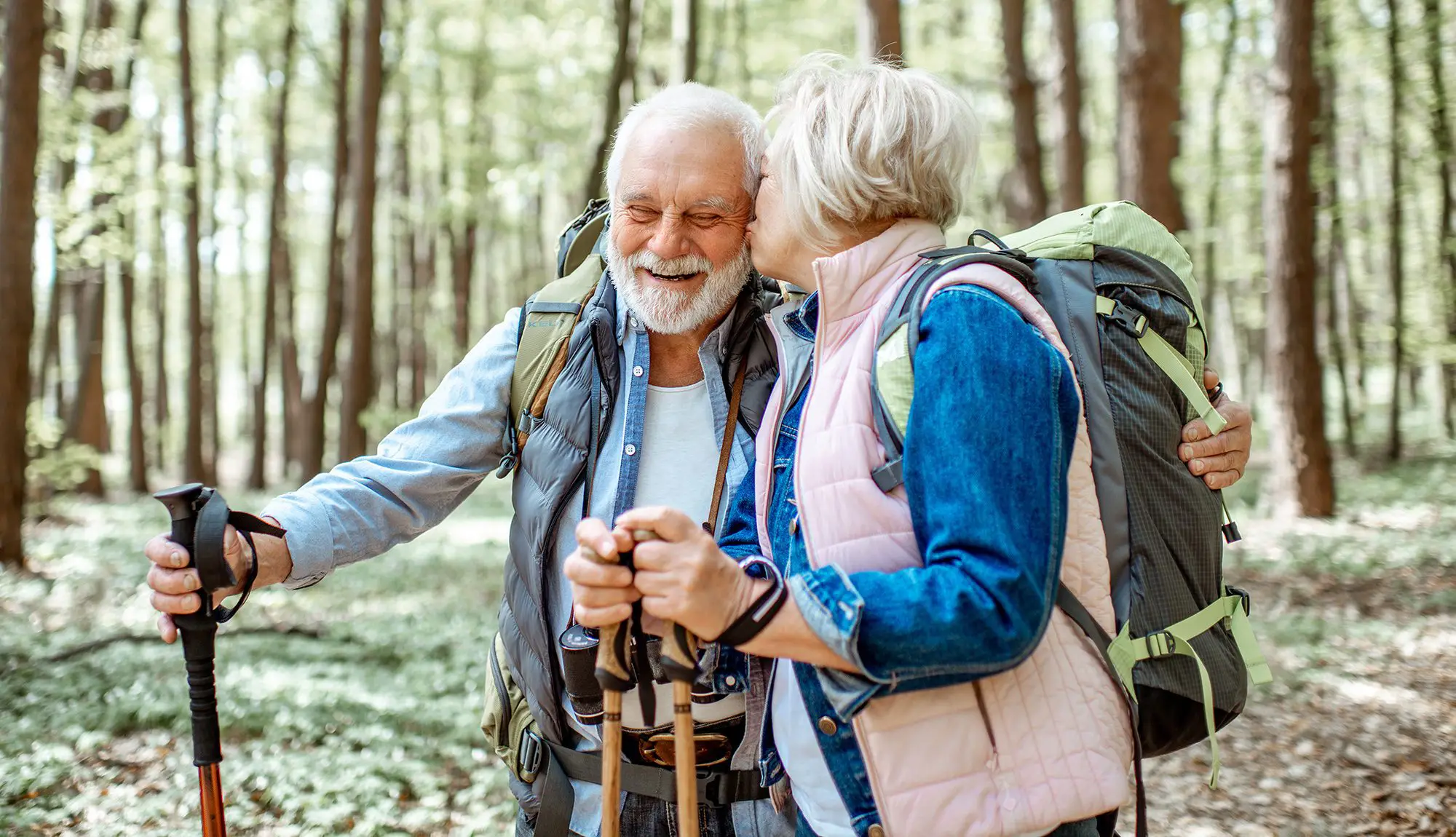 two seniors take a hike together