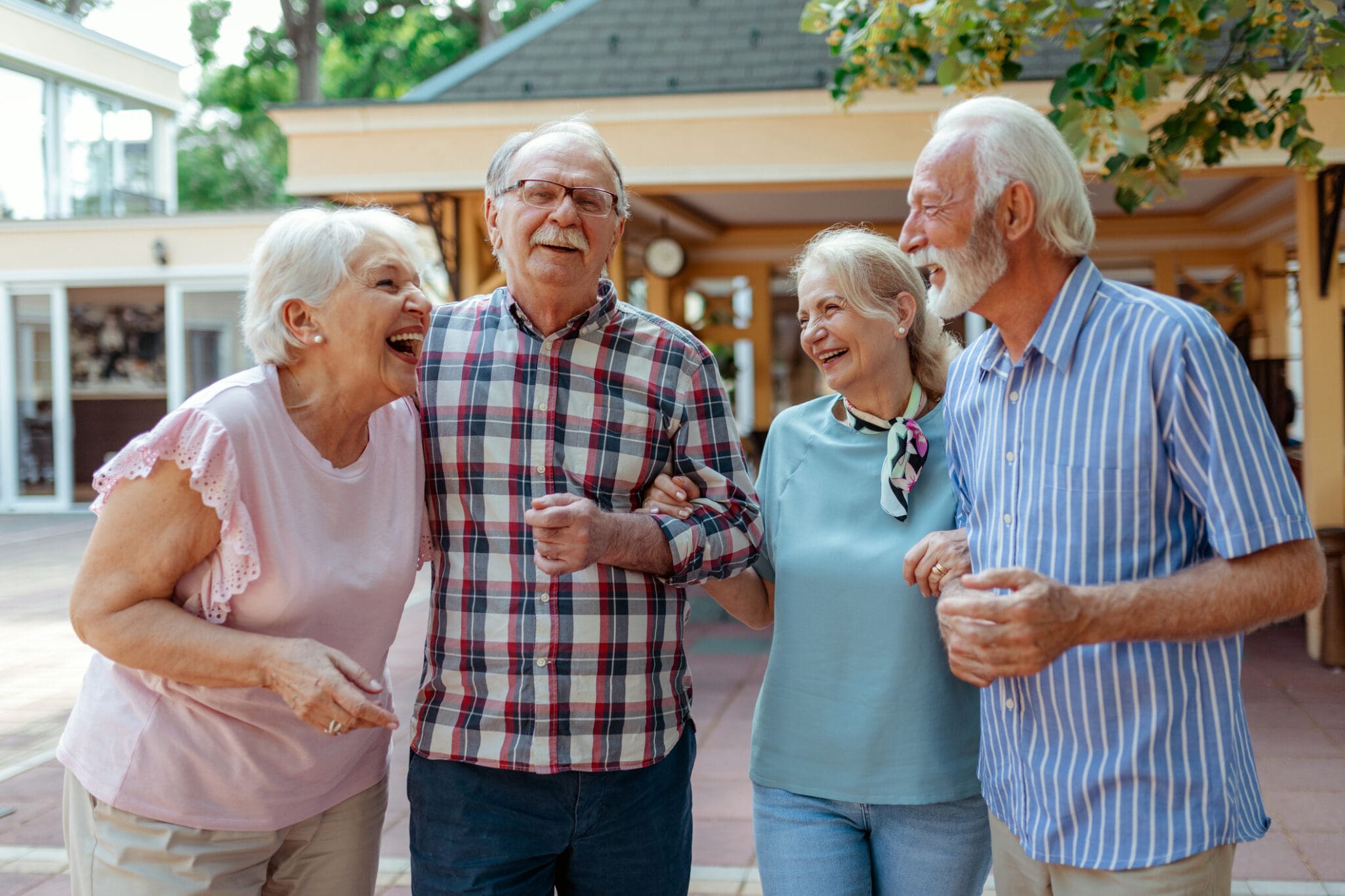 Senior couples laughing together