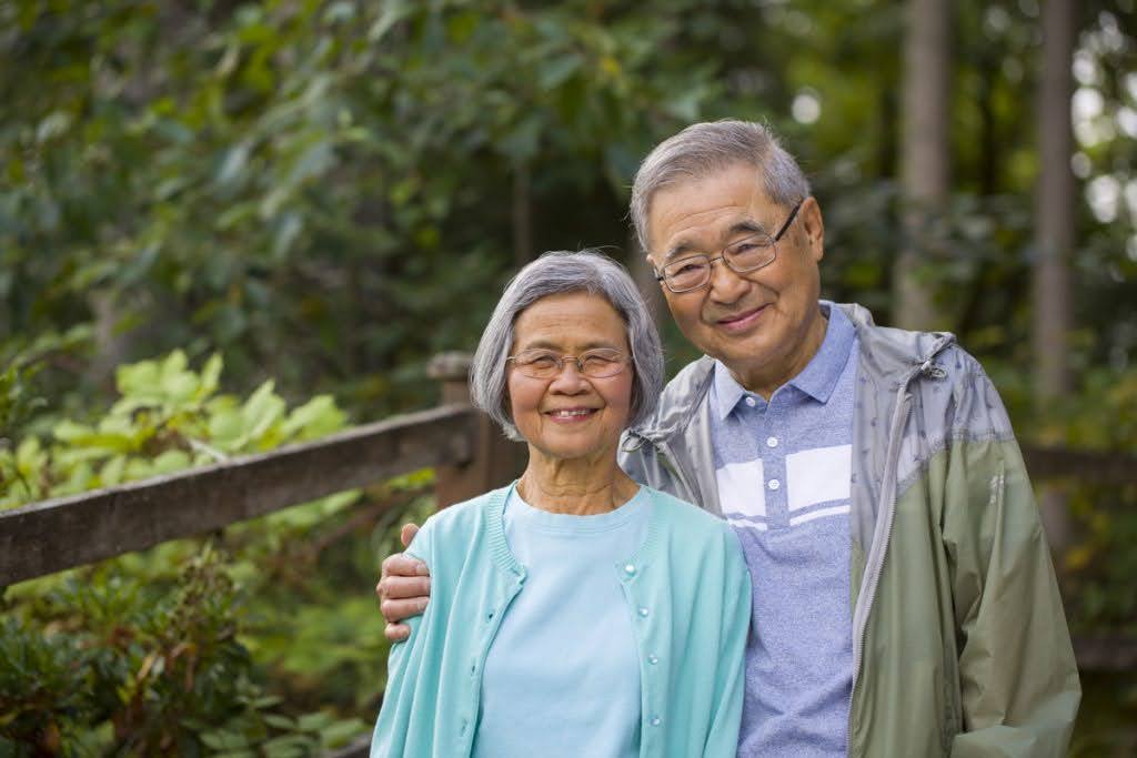 Senior couple smiling for a photo