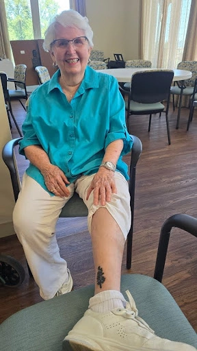 senior living resident Barbra celebrating a 92nd birthday with a new tattoo